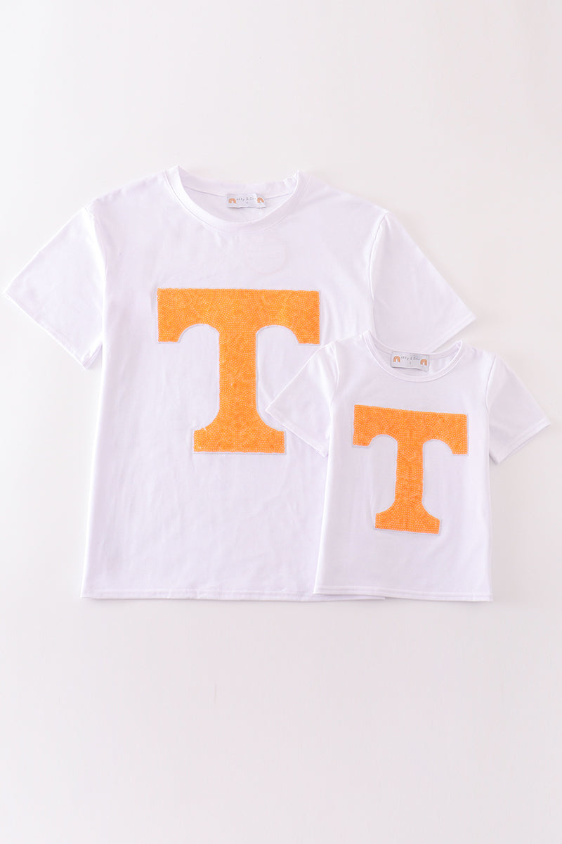 Matching Tennessee sequin tops in vibrant orange with playful sparkle for mom and child.