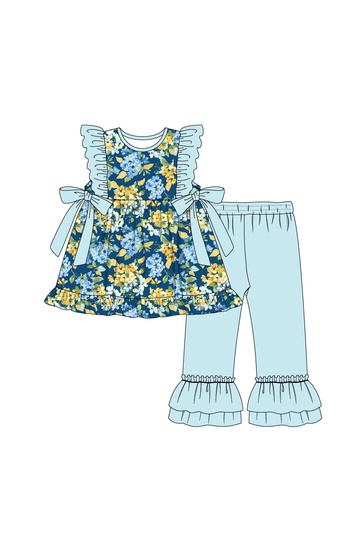 Golden meadow print ruffle girl set with floral pattern and playful ruffles.