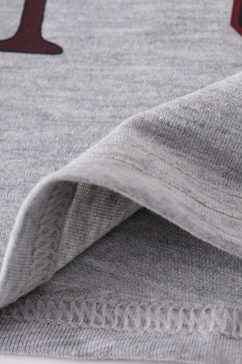 South Carolina football-themed boy's top with playful team graphics.