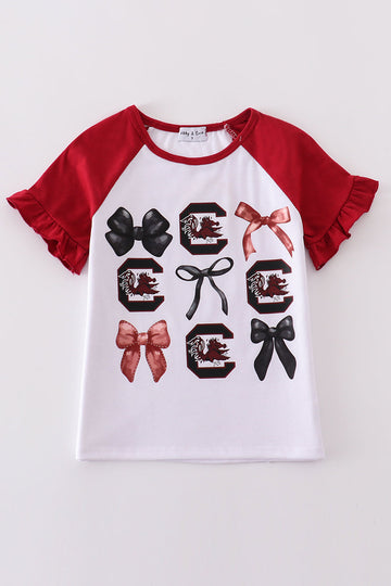 Cheerful girl’s top with colorful South Carolina bow pattern, perfect for playful outings.