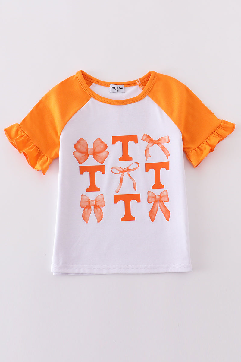 Charming Tennessee bow print top for girls, perfect for playful adventures.
