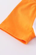 Tennessee football-themed boy's top with vibrant orange and white print.