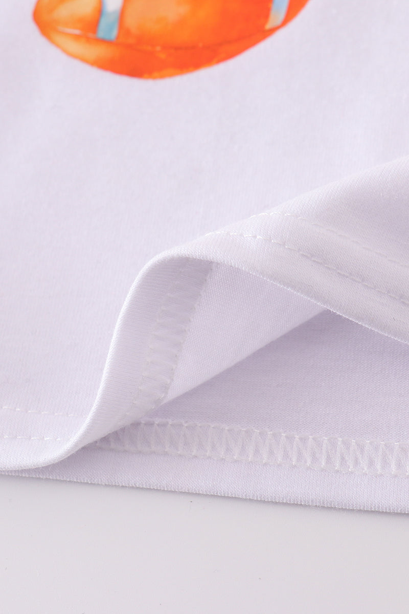 Tennessee football-themed boy's top with vibrant orange and white print.