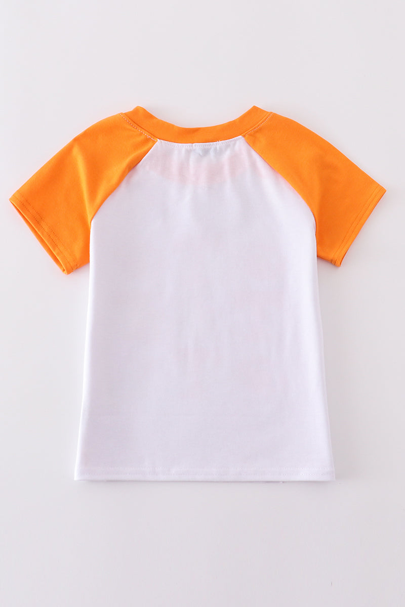Tennessee football-themed boy's top with vibrant orange and white print.