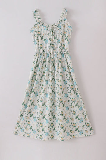 A charming green floral print mom dress, perfect for playful adventures.