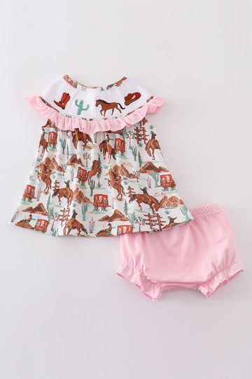 Pink smocked bloomer set with western cowboy embroidery, perfect for playful adventures.