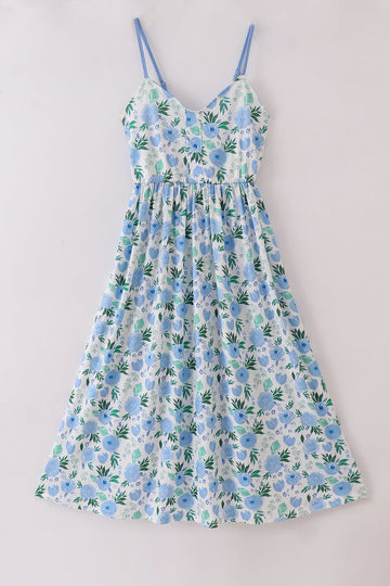 Whimsical floral mom dress with vibrant garden print, perfect for spring outings.