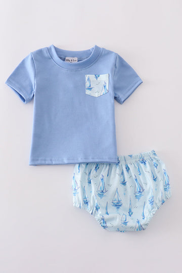 Blue sailboat print boy bloomer set with a playful nautical design.