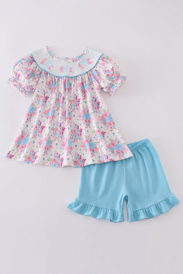 Blue petal meadow embroidery girl set: floral-patterned top and matching shorts.