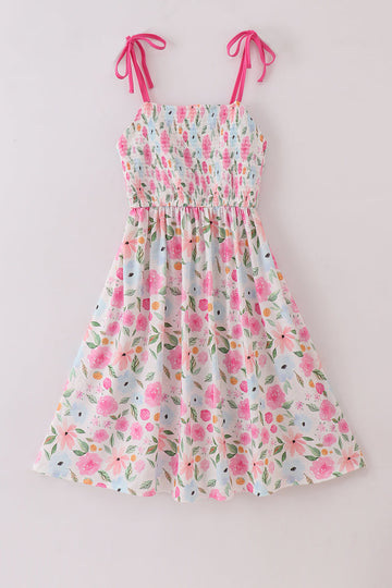 Floral smocked mom dress with pastel blossoms, perfect for spring outings.