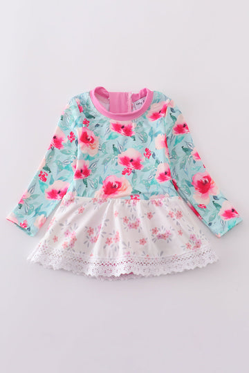 Blushing rose garden print girl one-piece leotard with pink floral pattern.