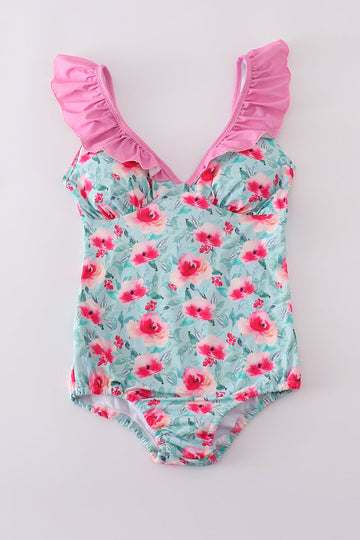 Mom swimsuit with a blushing rose garden print, perfect for sunny beach days.