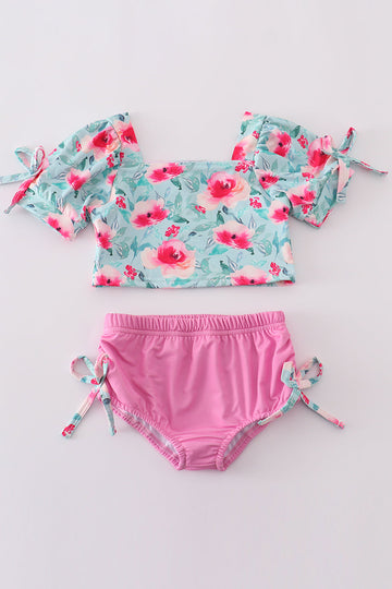 Girl's 2-piece swimsuit with blushing rose garden print, perfect for summer fun.