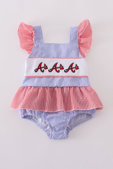 Navy seersucker one-piece swimsuit with Atlanta Braves embroidery for girls.