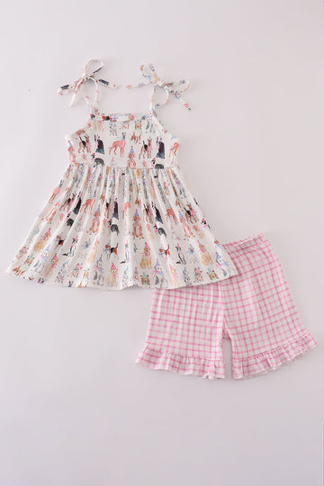 Pink party puppy print set featuring a playful dog pattern on cozy children's pajamas.