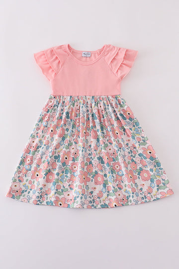 Pink summer floral print ruffle dress with playful flowers and soft, flowing fabric.