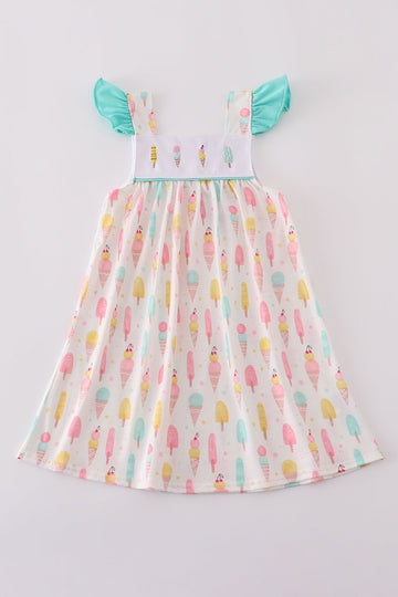 A charming mint dress with ice cream embroidery, perfect for summer fun.