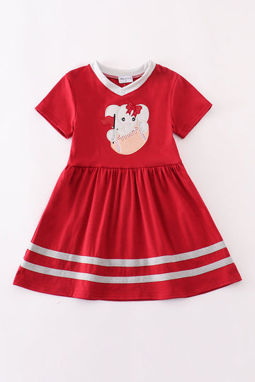 Adorable red dress with an elephant football applique, perfect for game day.