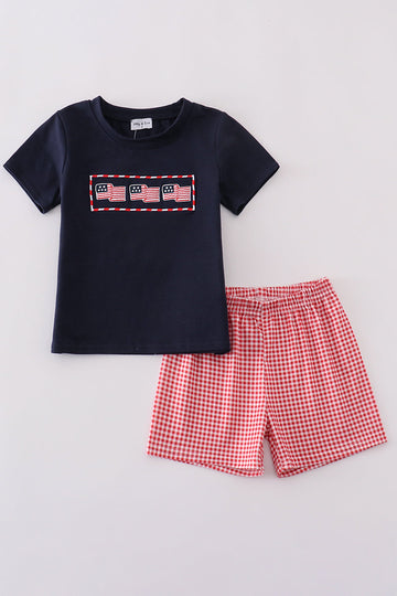 Navy shorts set with playful flag embroidery, perfect for summer adventures.
