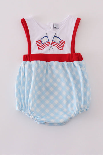 Blue gingham bubble romper with flag embroidery and a cute bow accent.