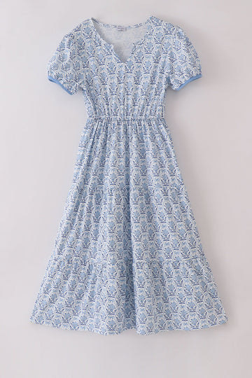 Blue toile garden bow mom tiered dress with a charming floral pattern.