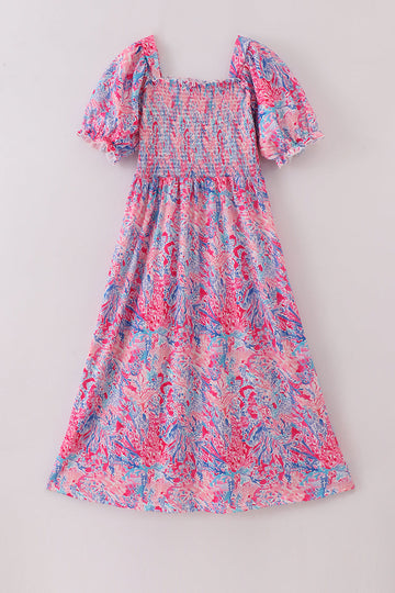 Pink coral reef patterned smocked ruffle dress, perfect for playful summer days.