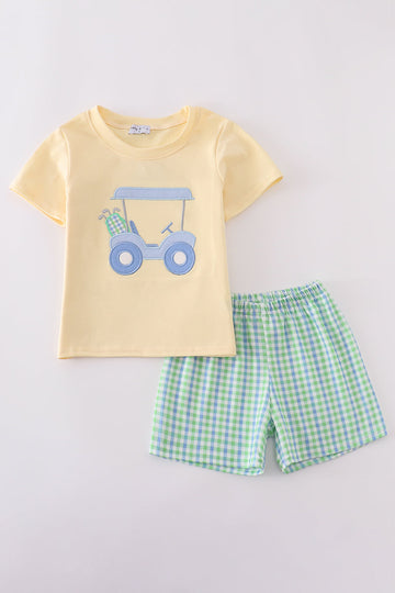 Yellow gingham shorts set with cute golf cart applique, perfect for summer fun.