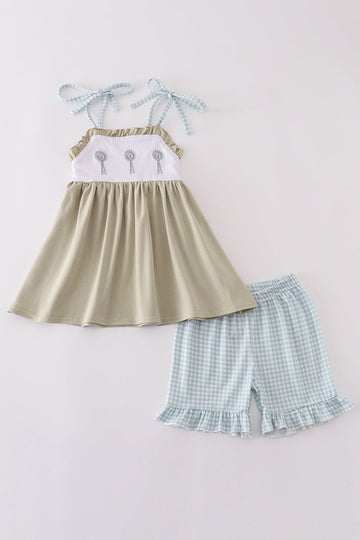 Green farm-themed shorts set with windmill embroidery and playful ruffle details.