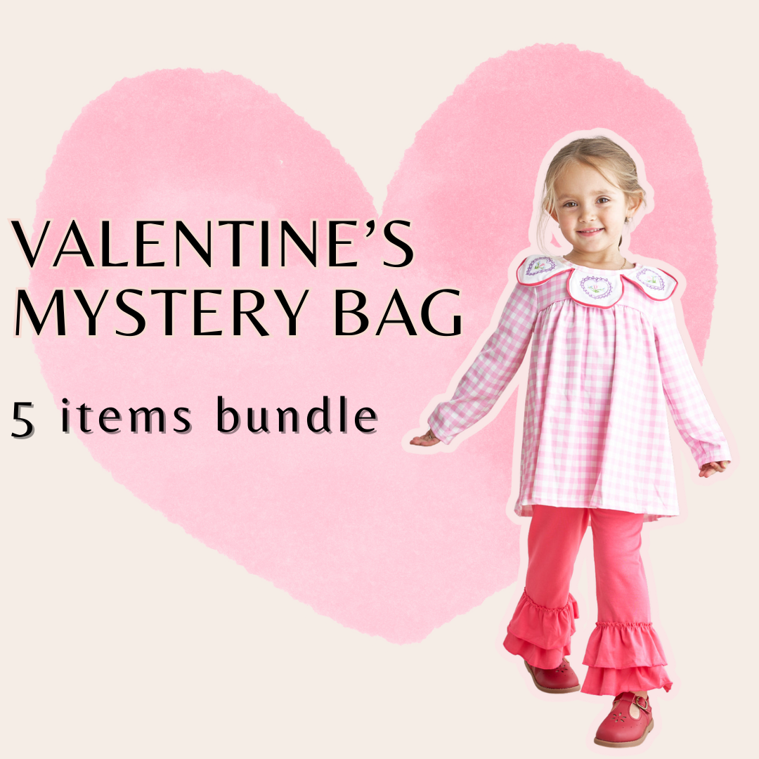 Valentine-themed children's clothing bundle with heart patterns and vibrant colors.