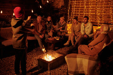 playing charades around a bonfire
