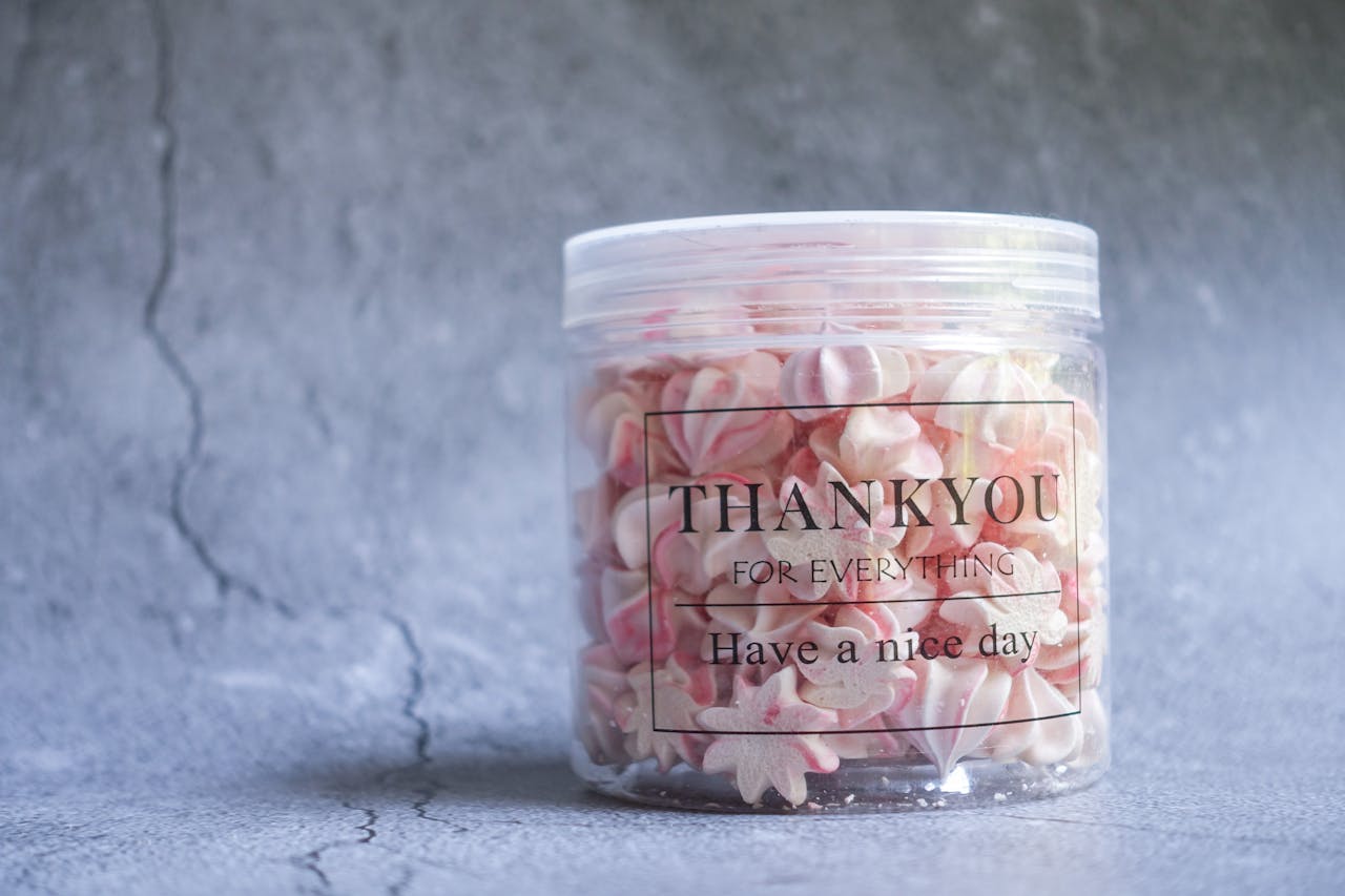 Gratitude Jar filled with pink items