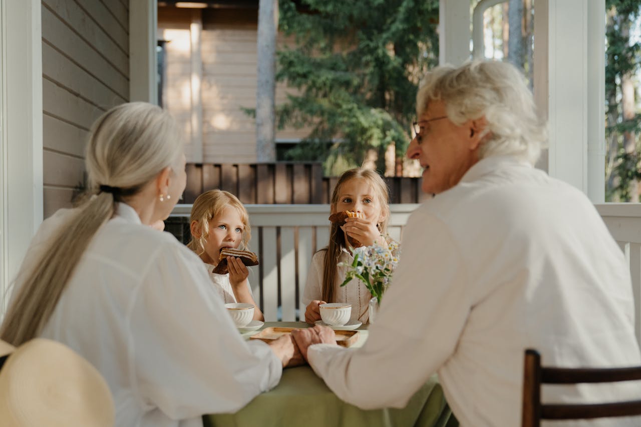 Grandparents having sweets with grandkids