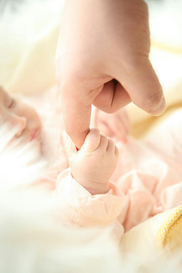 Why Do Newborns Grab Your Finger? The Moro Reflex Explained