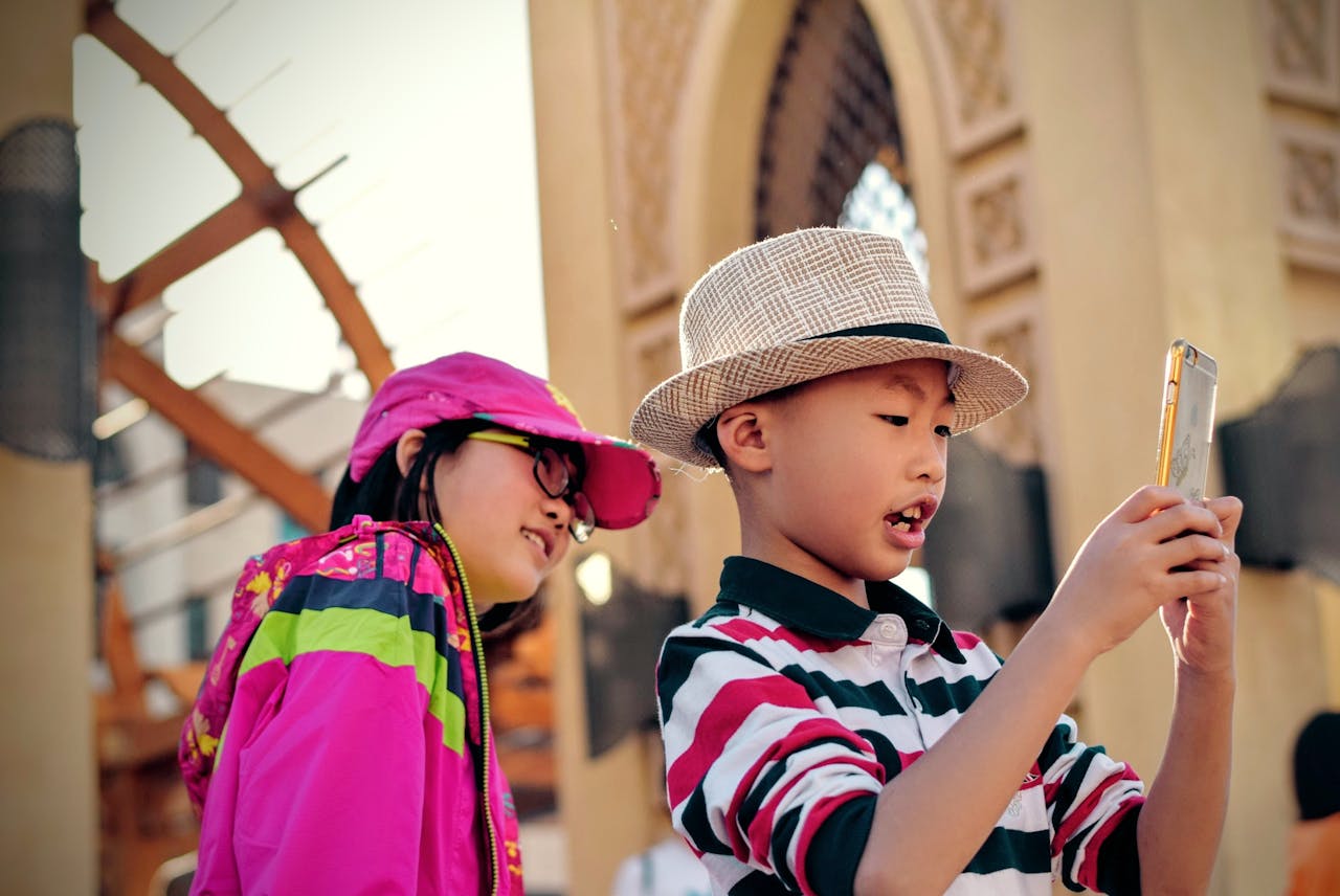 Kids Talking Pictures At Vacations