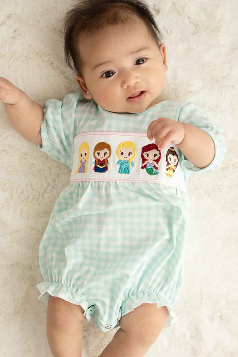 Blue gingham bubble romper with princess embroidery, perfect for playful summer days.