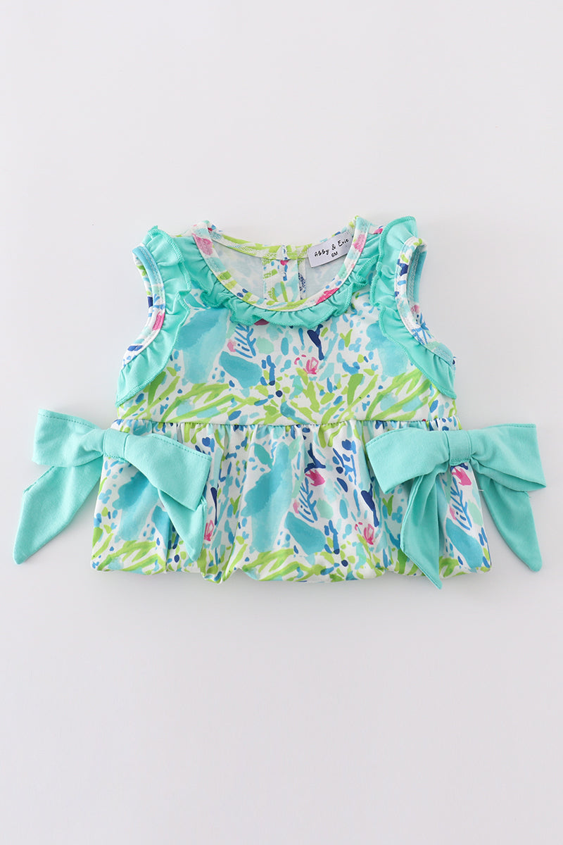 Tropical breeze print bubble romper with vibrant palm leaves, perfect for summer fun.