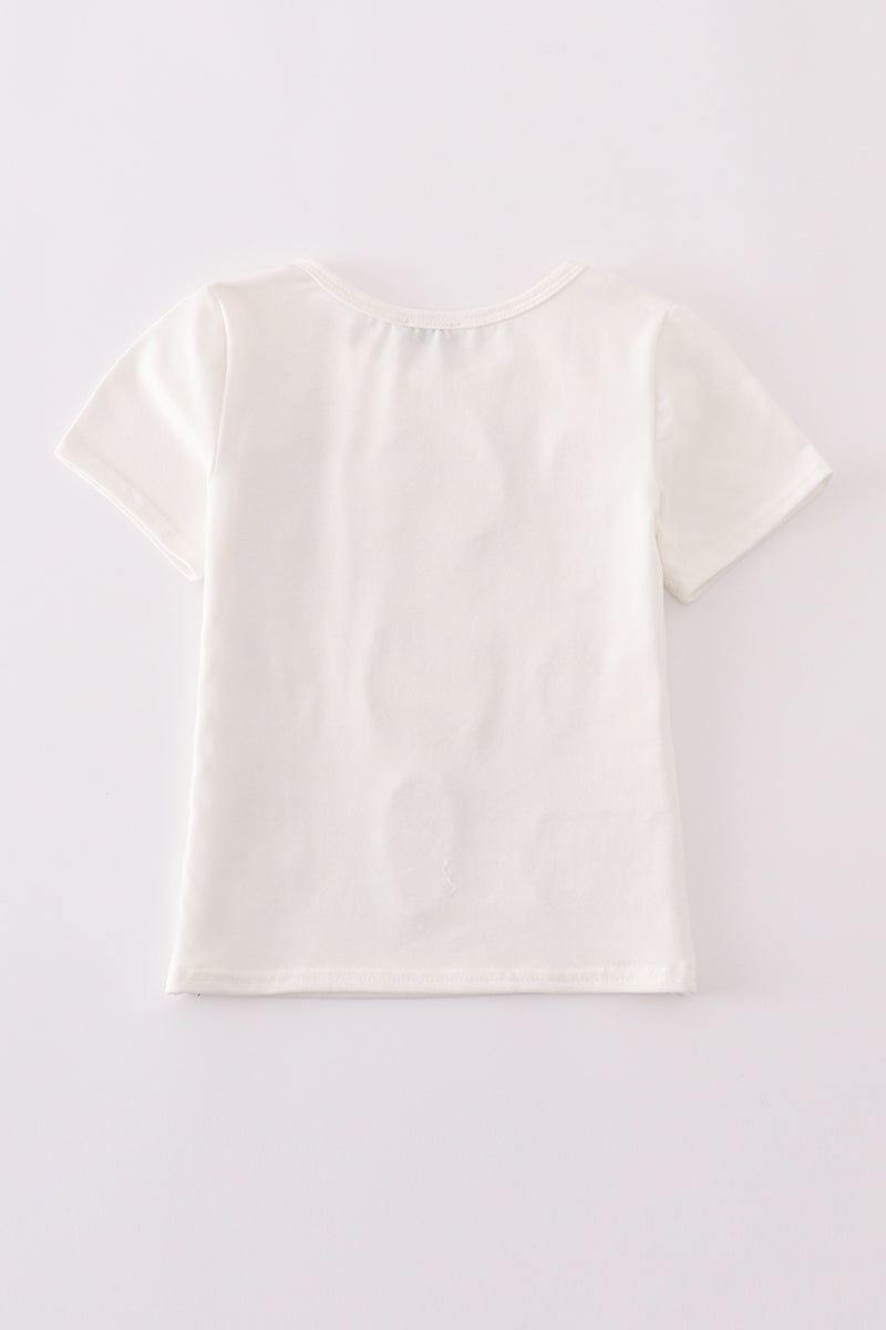 Children's top with flag bow, ice-cream, and sequin details, perfect for matching outfits.