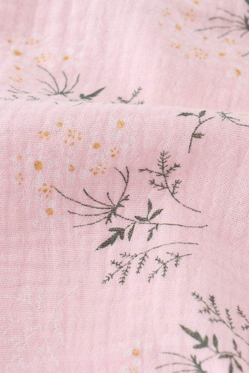 Pink floral muslin ruffle bubble romper for girls, perfect for springtime play.