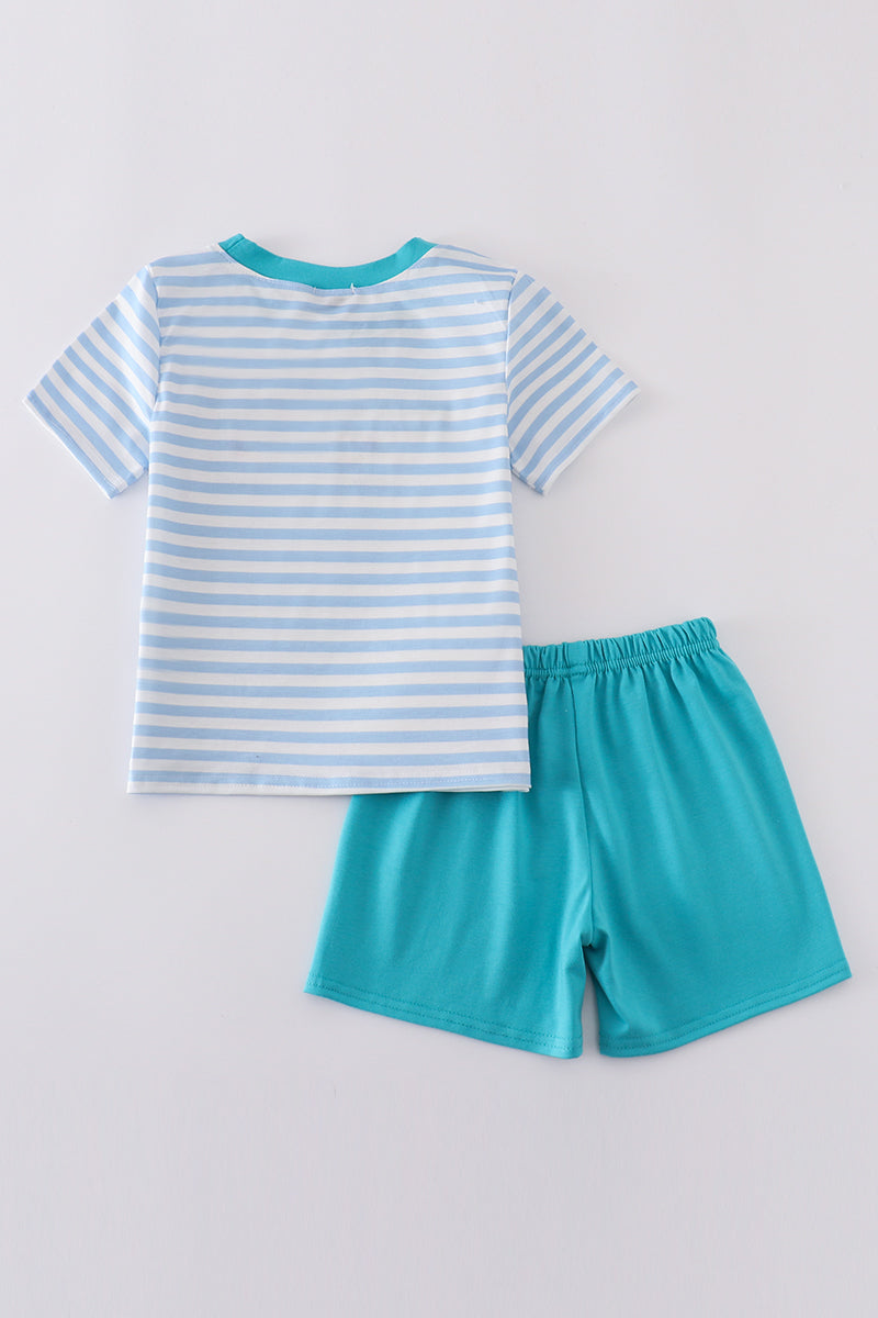 A charming boy's outfit with blue stripes and helicopter embroidery, perfect for playtime.