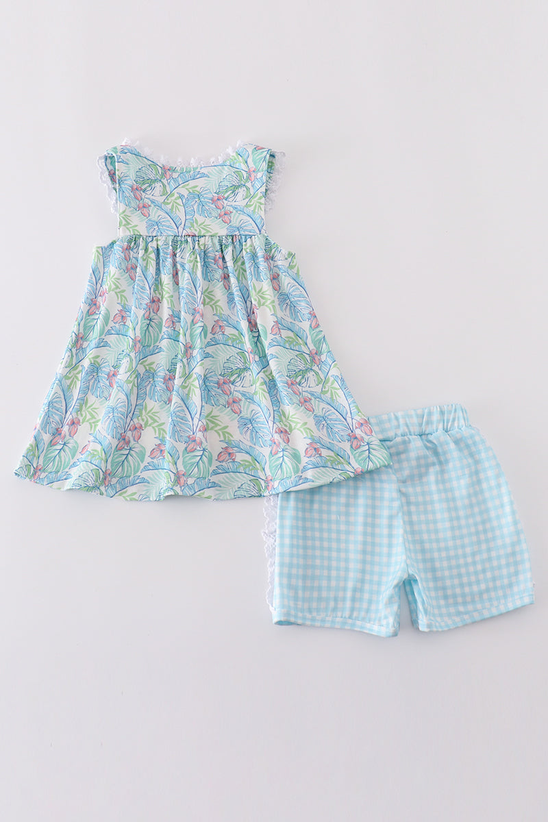 Tropical rainforest plant print kids' set with vibrant green and blue leaves.