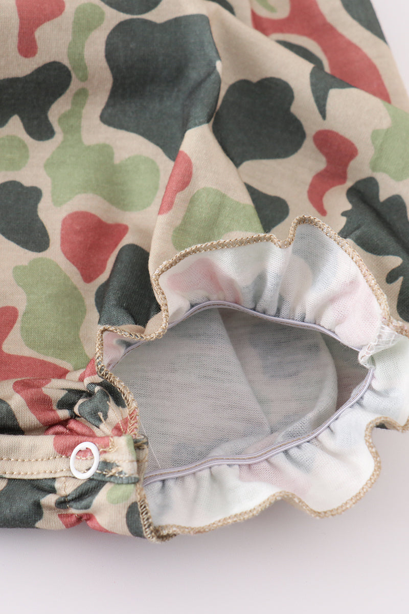 Camouflage bubble romper with cross embroidery, perfect for playful outdoor adventures.