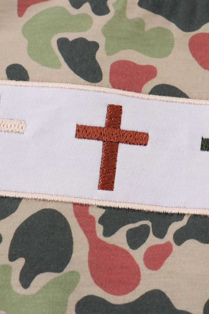 Cozy camouflage top with playful cross embroidery, perfect for adventurous kids.