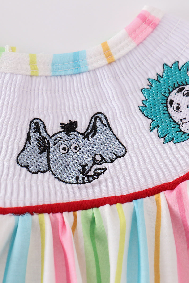 Adorable striped bubble romper with Dr. Seuss embroidery, perfect for playtime.