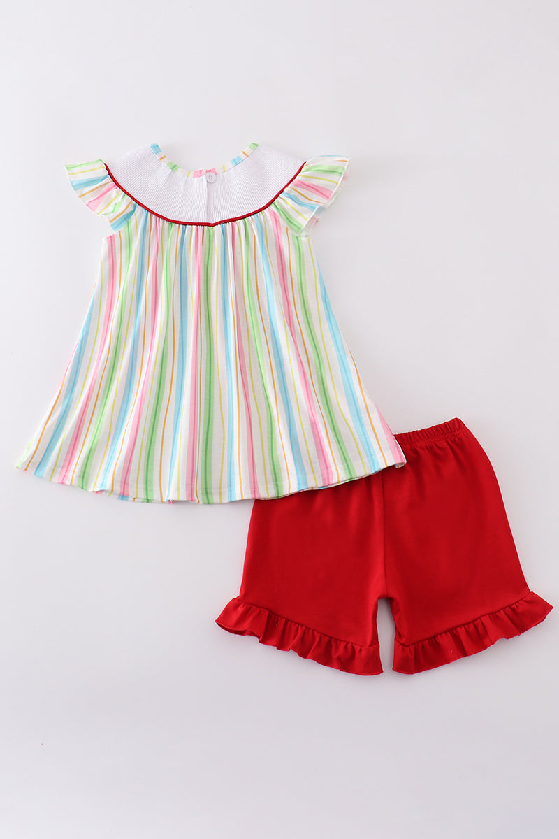 Children's striped smocked set with Dr. Seuss embroidery, perfect for playtime.