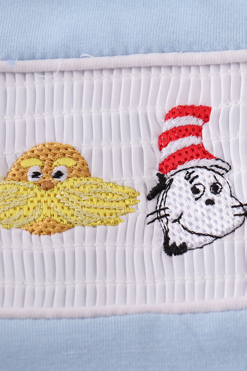 Blue Dr. Seuss smocked top with playful embroidery, perfect for kids.