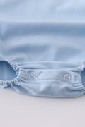 Blue bubble romper with Dr. Seuss embroidery and smocked detailing, perfect for playtime.