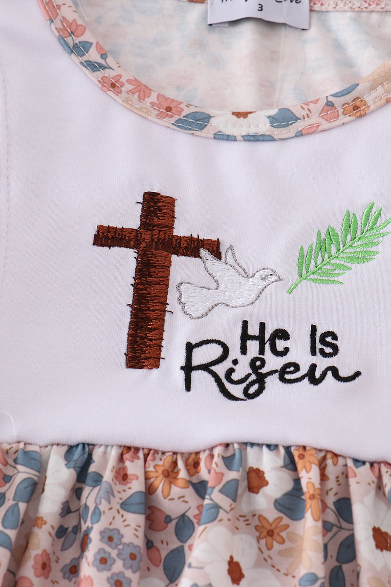 Easter-themed girls' outfit with "He is Risen" embroidery and pastel accents.