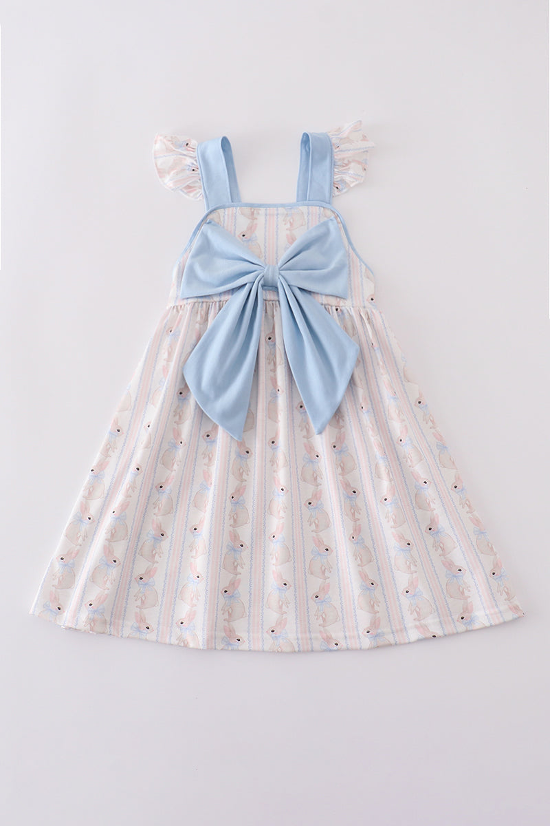 Adorable blue dress with bunny print and a charming bow, perfect for spring.