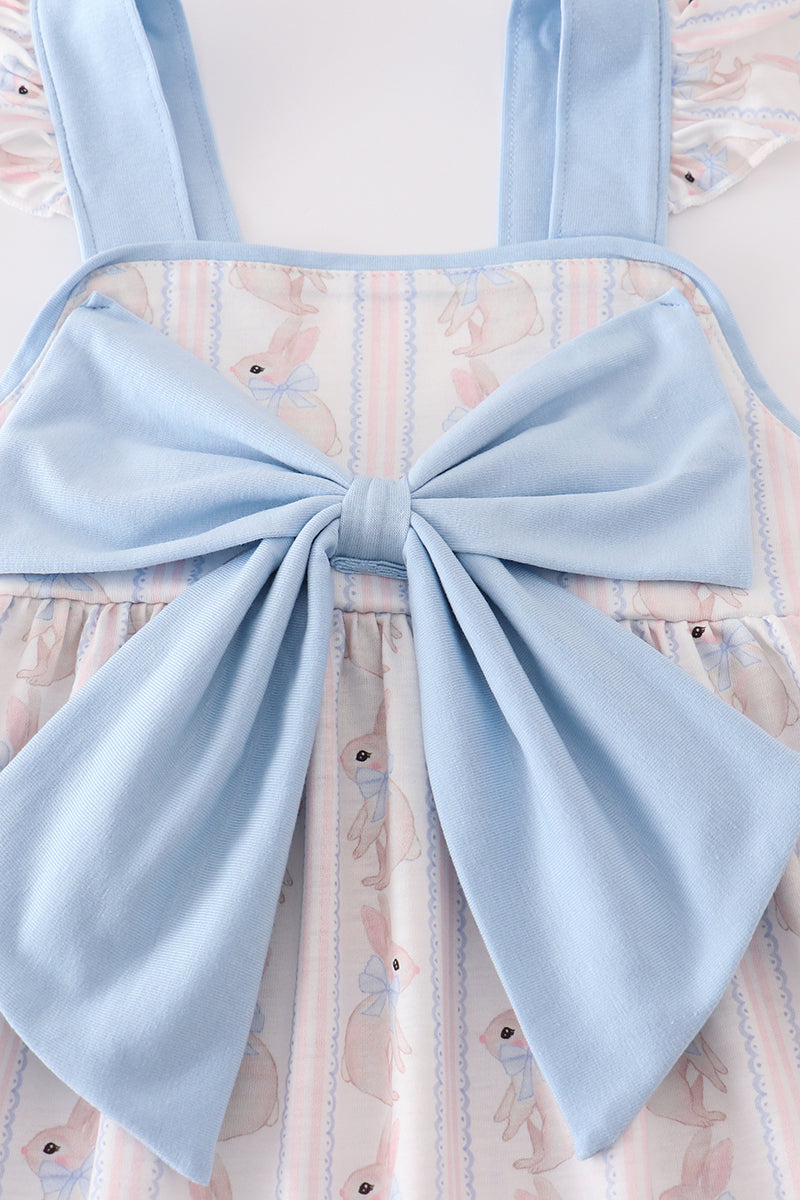 Adorable blue dress with bunny print and a charming bow, perfect for spring.