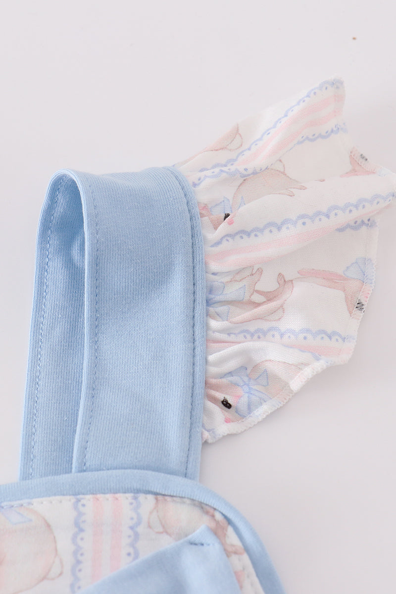 Adorable blue dress with bunny print and a charming bow, perfect for spring.